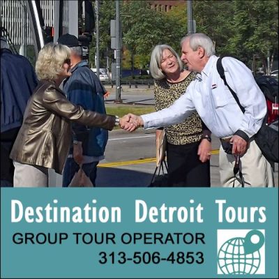 Kim Greeting Detroit Bus tour
